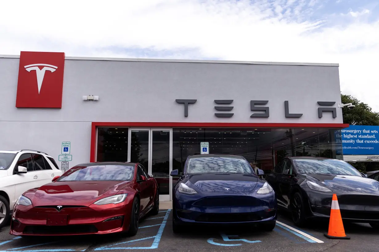 Tesla electric vehicles are parked in a Tesla dealer in Paramus, New Jersey,