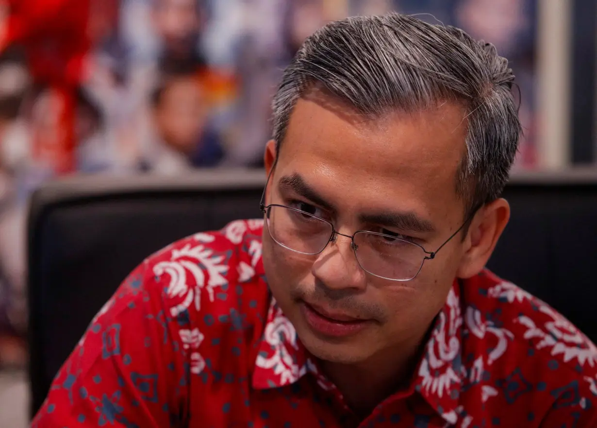 Malaysia Communications Minister Fahmi Fadzil speaks during an interview at Kuala Lumpur