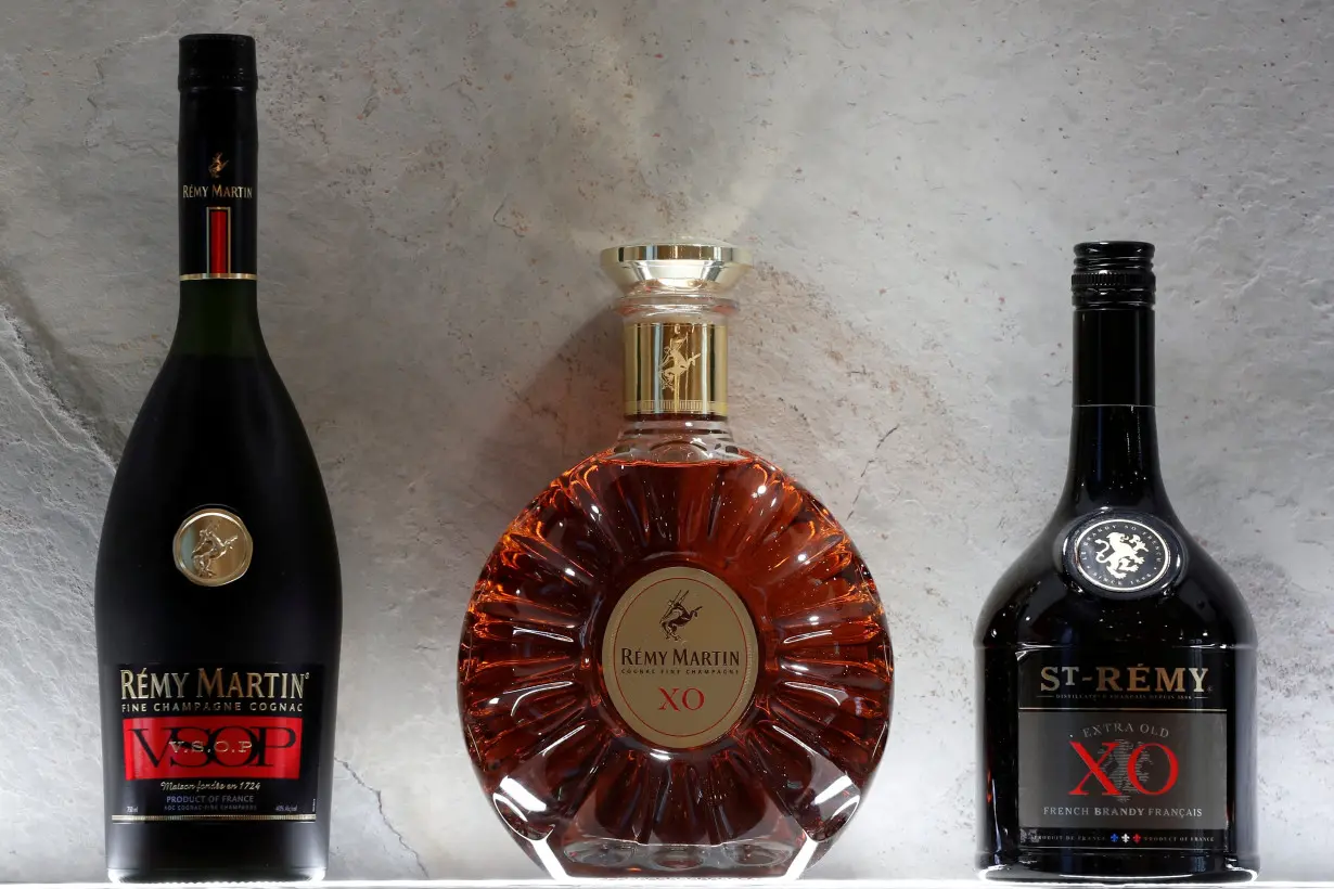 FILE PHOTO: Bottles of Remy Martin VSOP cognac, Remy Martin XO cognac and St-Remy XO Brandy are displayed at the Remy Cointreau SA headquarters in Paris