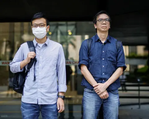 Hong Kong journalists found guilty of sedition in case critics say highlights decline in press freedom