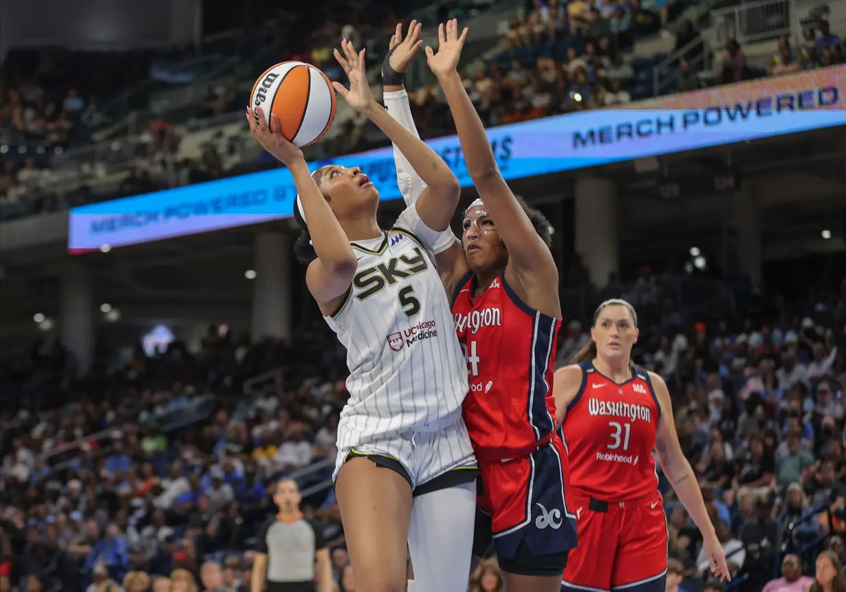 Reese drives to the basket for a layup against the Mystics.