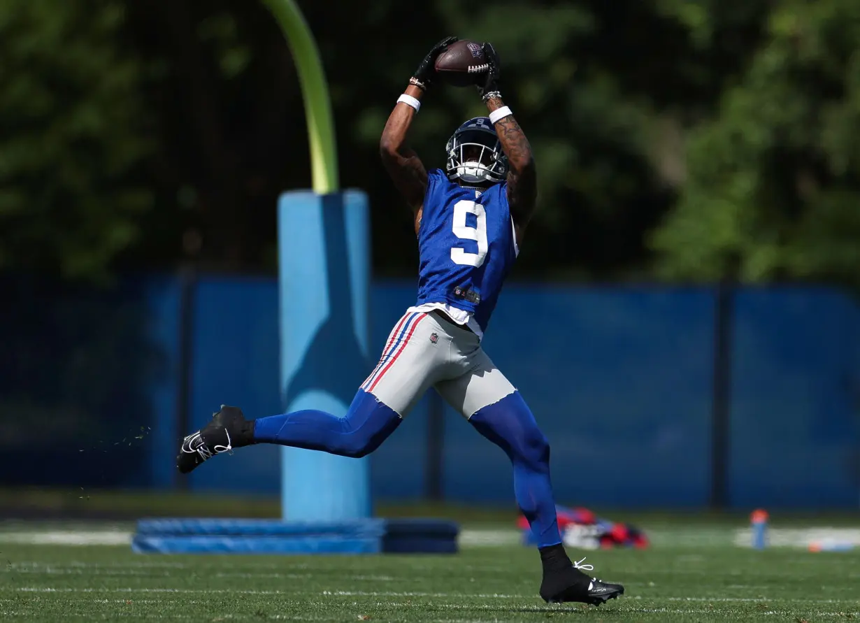 Malik Nabers makes a catch during OTA Offseason Workouts.