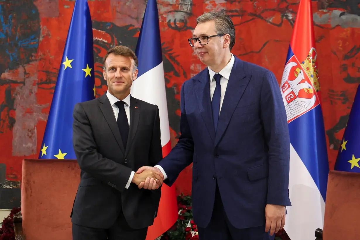 French President Macron meets Serbian President Vucic in Belgrade