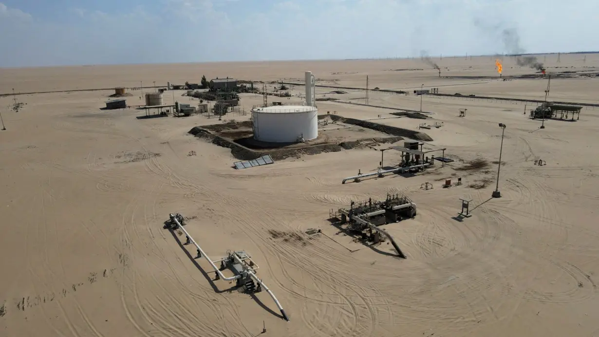 A general drone view shows the Nafoora oil field in Jakharrah