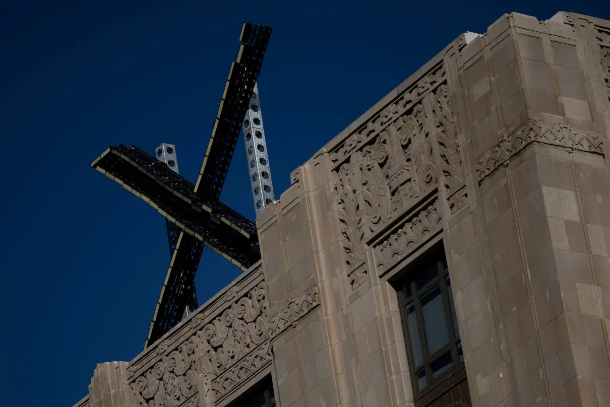 FILE PHOTO: 'X' logo is seen on the top of the headquarters of the messaging platform X, formerly known as Twitter in San Francisco