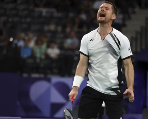 Jurgen Klopp joins the crowd at the Paralympics, cheering on long-time friend playing badminton