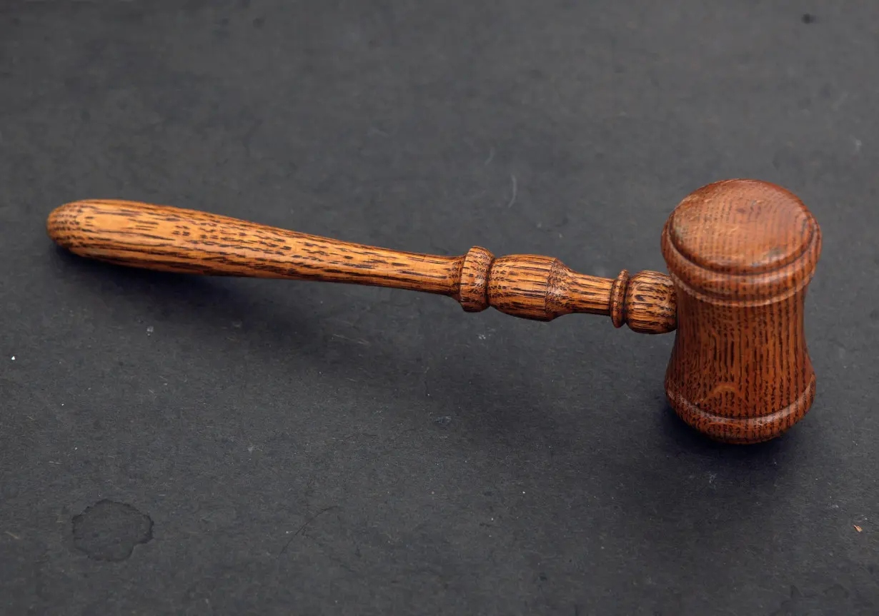 The judge's gavel is seen in court room 422 of the New York Supreme Court