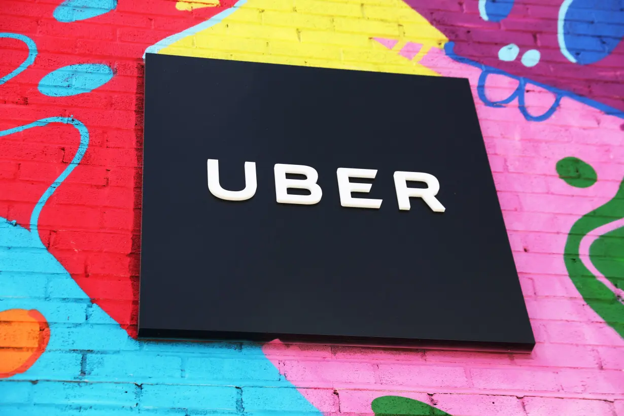 FILE PHOTO: Uber sign is seen on the outside of their Greenlight Hub in the Brooklyn borough of New York