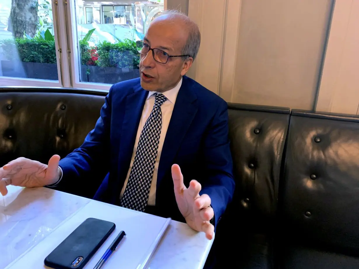 Libyan Central Bank Governor Sadiq al-Kabir talks during an interview with Reuters in London