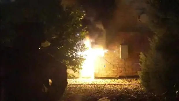 Video shows house's electrical breaker box arcing and causing small fire