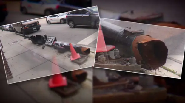 Rusted traffic light pole falls onto sidewalk in Chicago's West Loop