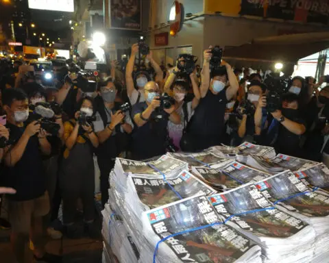 More Hong Kongers tune out the news as they adapt to Beijing's tightening grip
