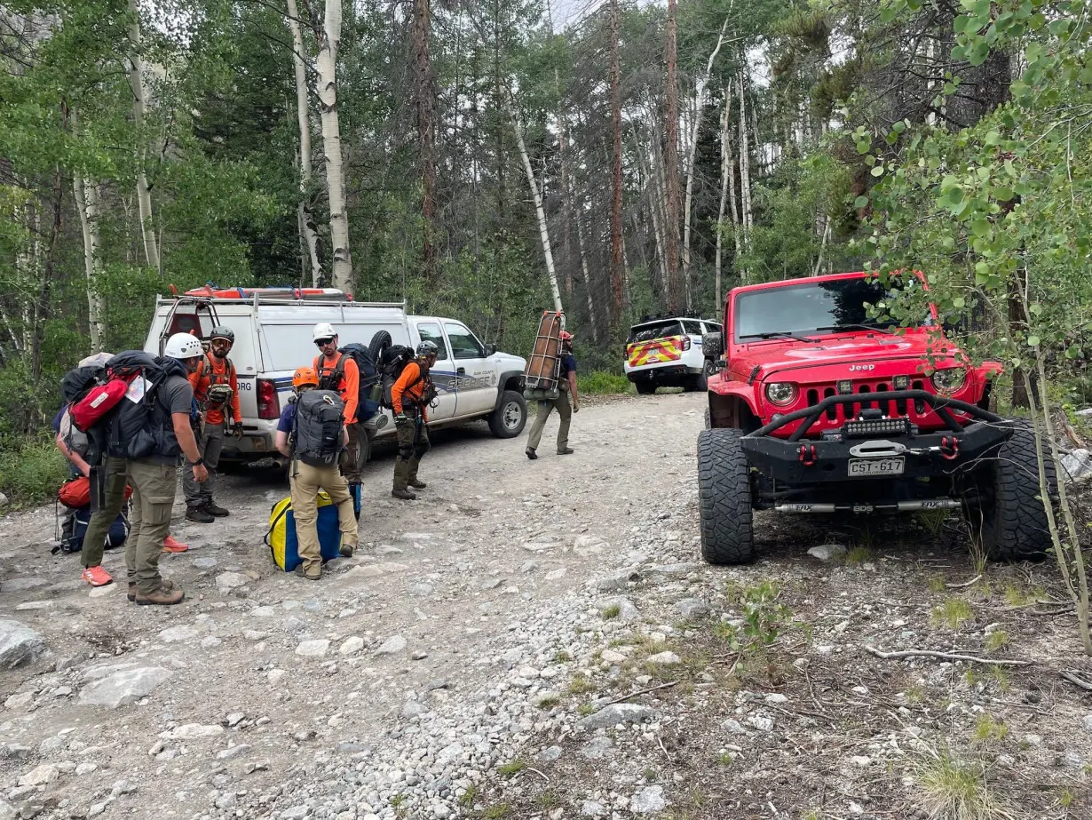 15 co-workers hiked up a Colorado mountain. There were only 14 when they came back down