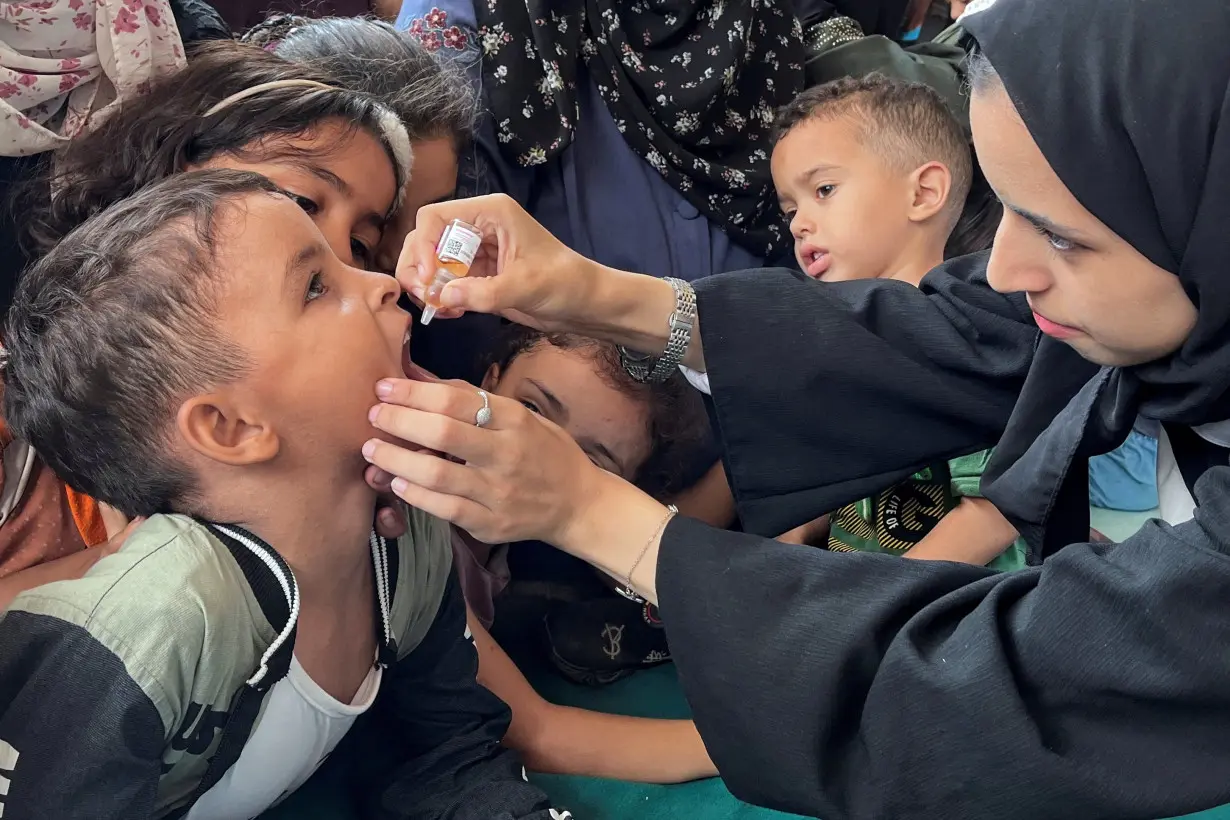 Palestinian children are vaccinated against polio, in Deir Al-Balah in the central Gaza Strip