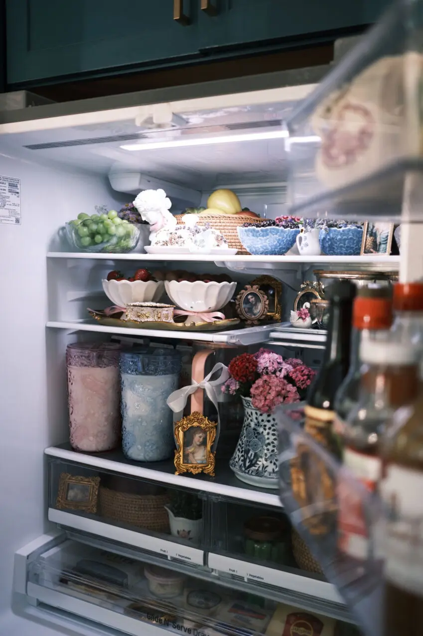 Decorating the inside of your fridge with picture frames and flowers? That's 'fridgescaping'