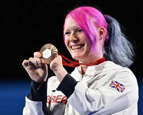 Britain’s Jodie Grinham becomes first athlete to win a Paralympic medal while pregnant