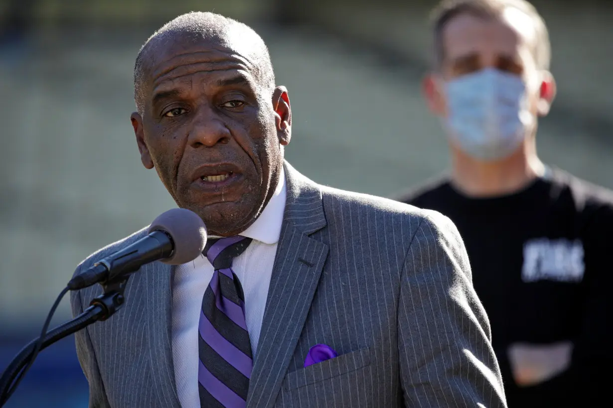 COVID-19 mass-vaccination of healthcare workers takes place at Dodger Stadium in Los Angeles