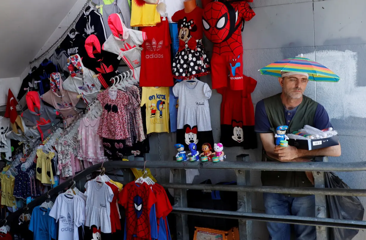 A street vendor sells toys at an underground passage in Istanbul