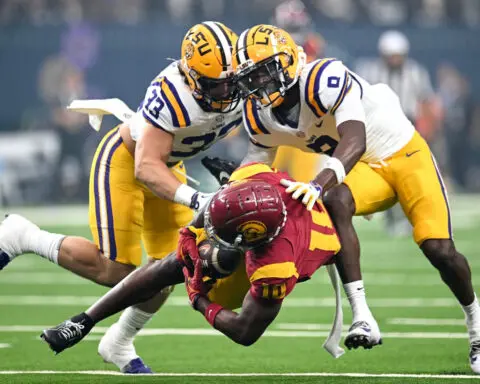 No. 23 USC scores touchdown in final seconds to earn big win over No. 13 LSU, causing outburst from Tigers coach Brian Kelly