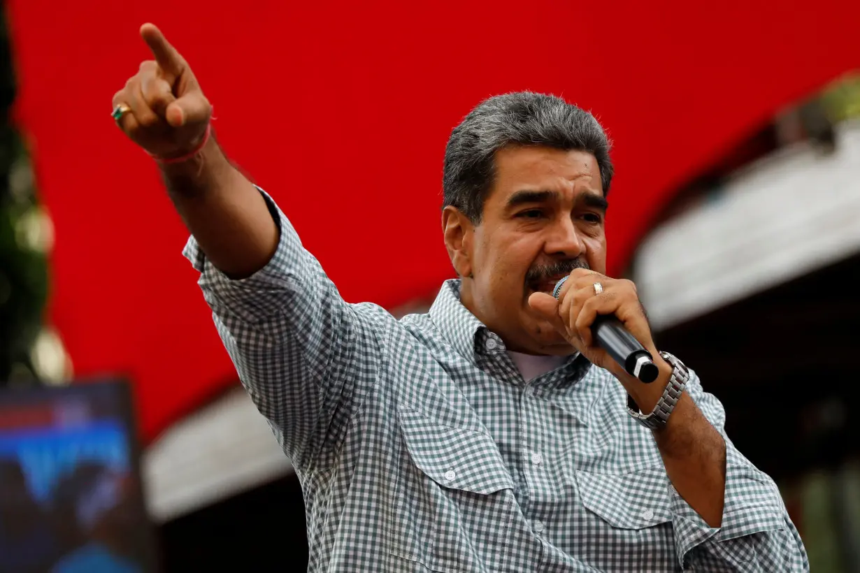 Government supporters celebrate the results of last month's presidential election, in Caracas