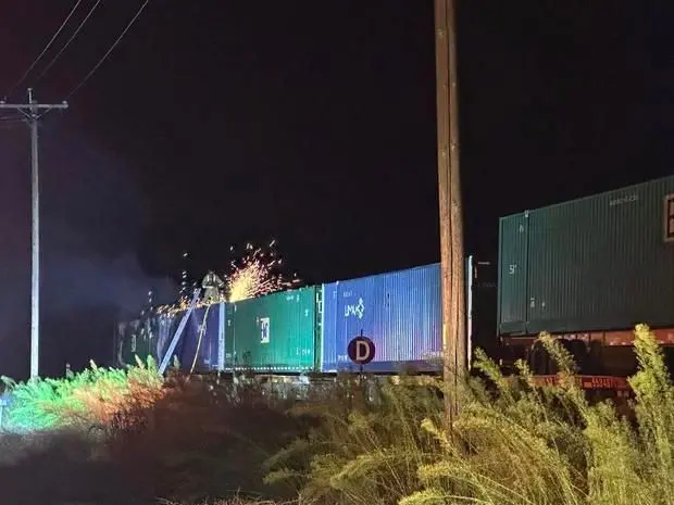 2 train cars carrying lithium-ion car batteries, other items catch fire