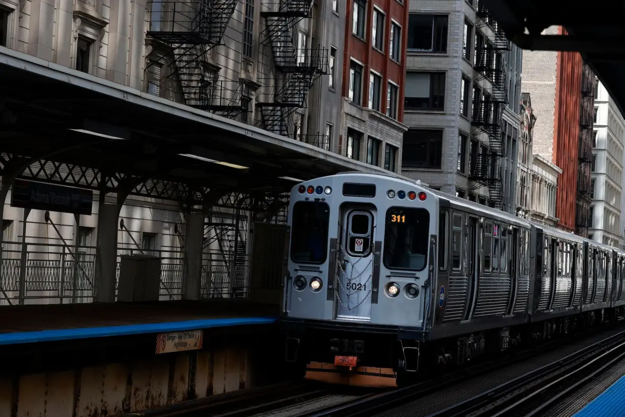 4 people shot dead on subway train near Chicago, suspect in custody