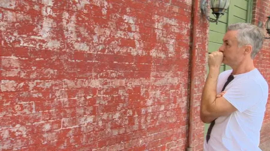 Artist uses social media to teach people about Baltimore's 'ghost signs'