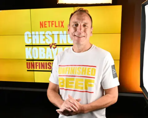 Joey Chestnut breaks own world record, beating rival Takeru Kobayashi in Netflix’s hot dog eating showdown