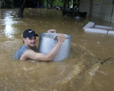 Fierce storm blows out of northern Philippines after leaving 14 dead in landslides and floods