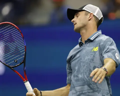 US Open: No. 1 Jannik Sinner gets past Tommy Paul to set up a quarterfinal against Daniil Medvedev