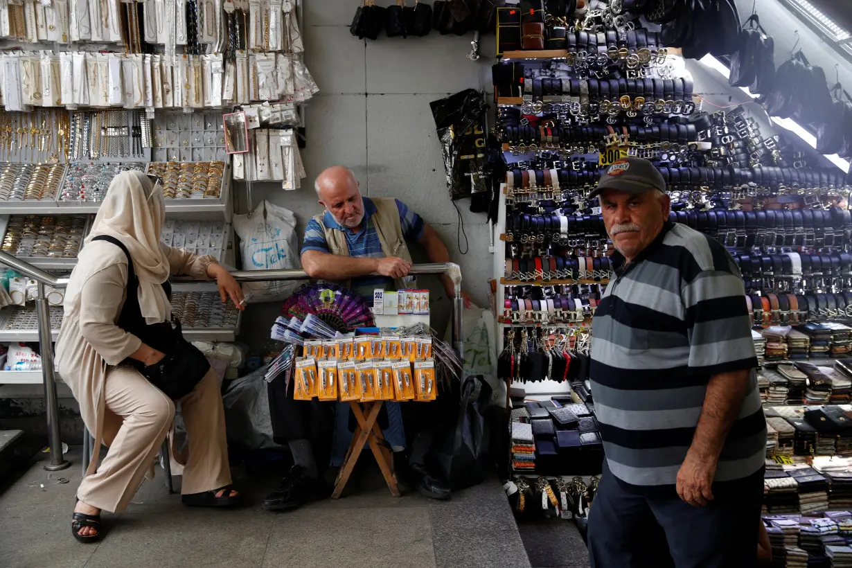 A street vendor waits for customers at an underground passage in Istanbul