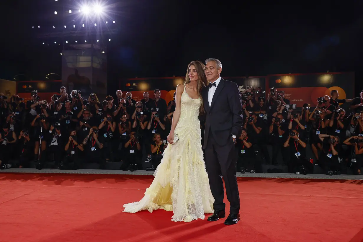 APTOPIX Italy Venice Film Festival Wolfs Red Carpet