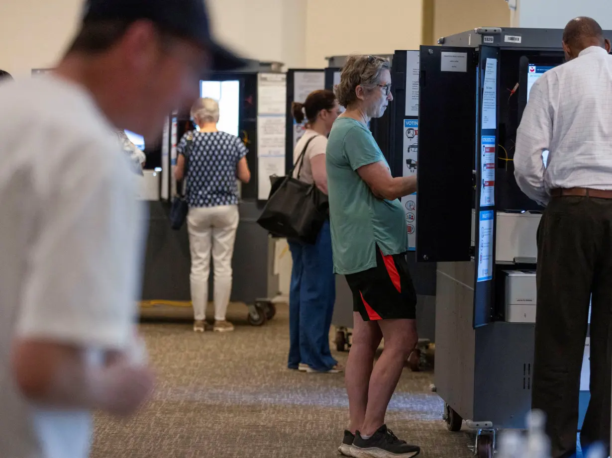 Fulton County voters cast their ballots during the Georgia primary on Election Day at Morningside Presbyterian Church in Atlanta