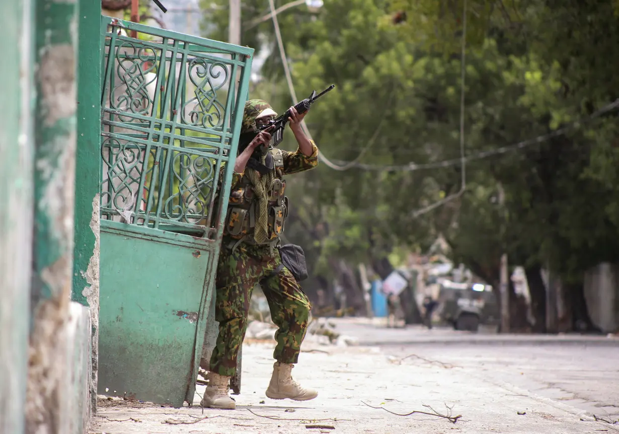 FILE PHOTO: Kenyan and Haitian police patrol in Port-au-Prince