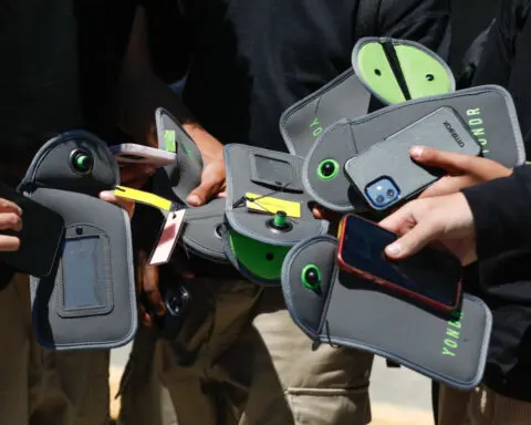 All-black outfits, hoodies, Crocs, cell phones and mirrors. Some students are returning to school with new bans in effect
