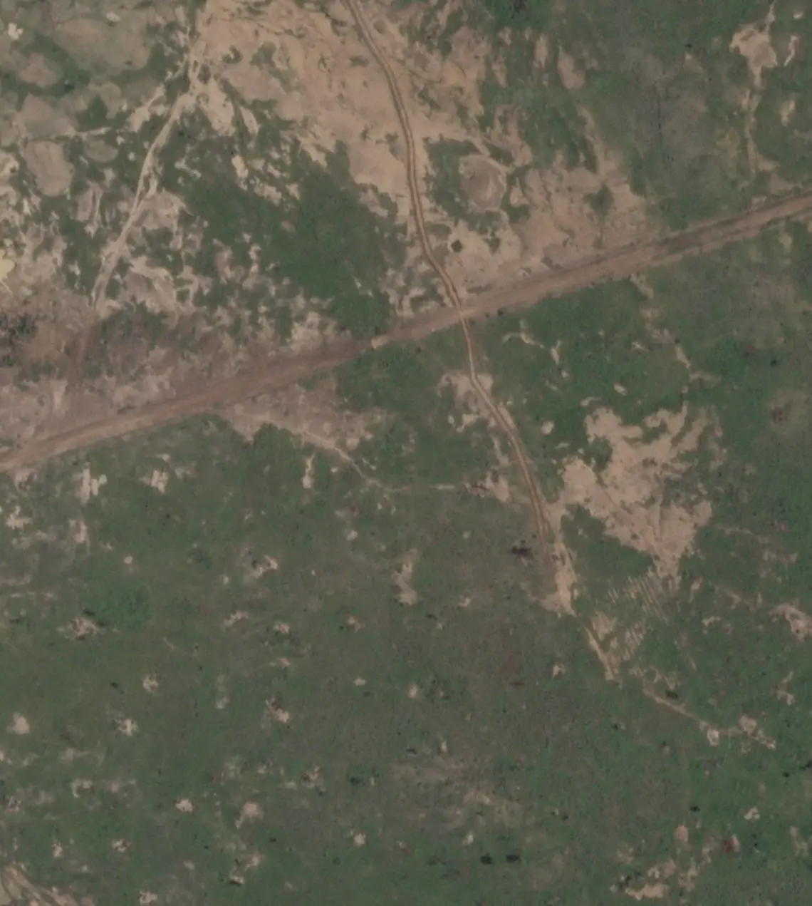 FILE PHOTO: A satellite image shows a newly-built trench near Barsalogho