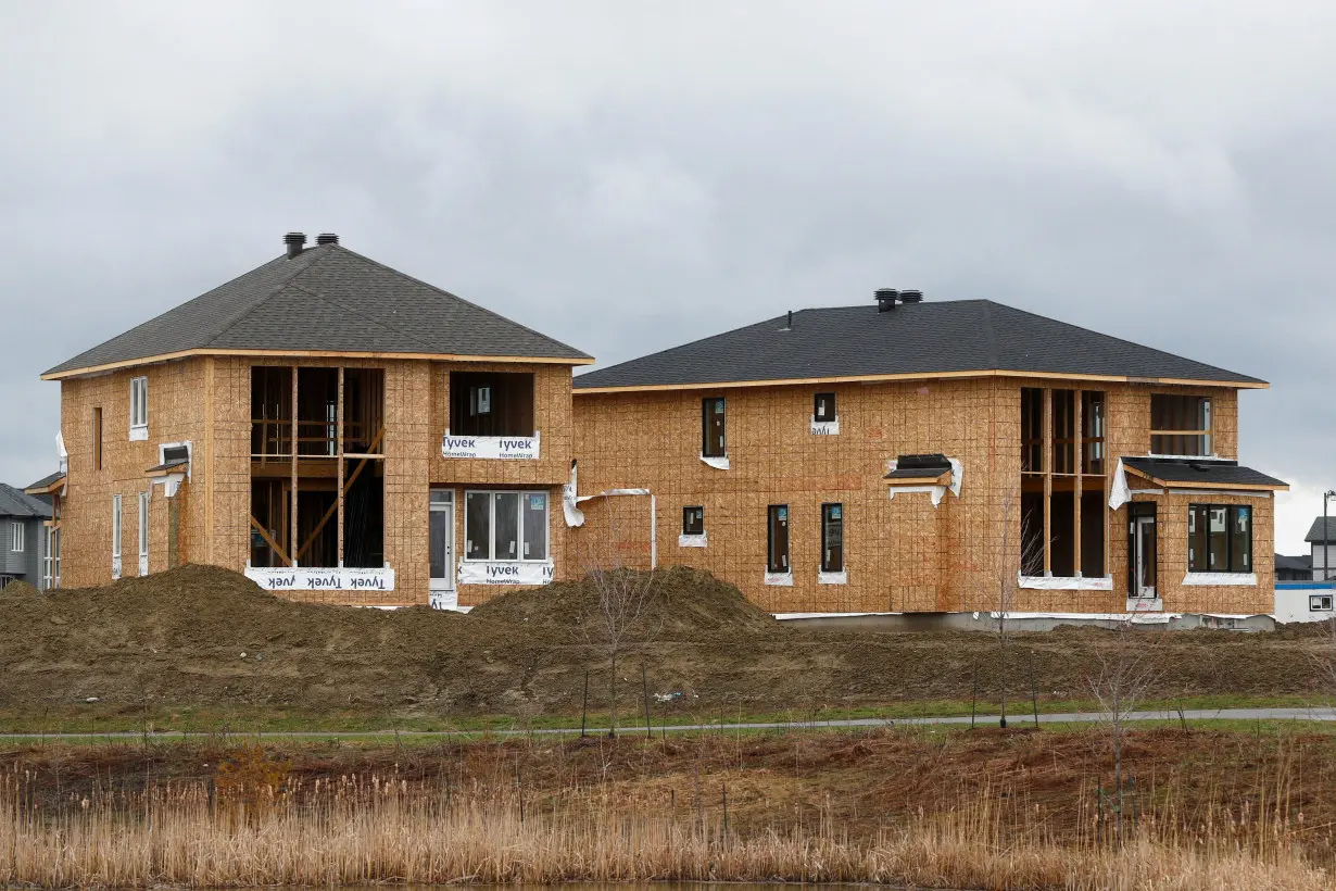 FILE PHOTO: Houses are seen for sale and under construction in a neighbourhood of Ottawa