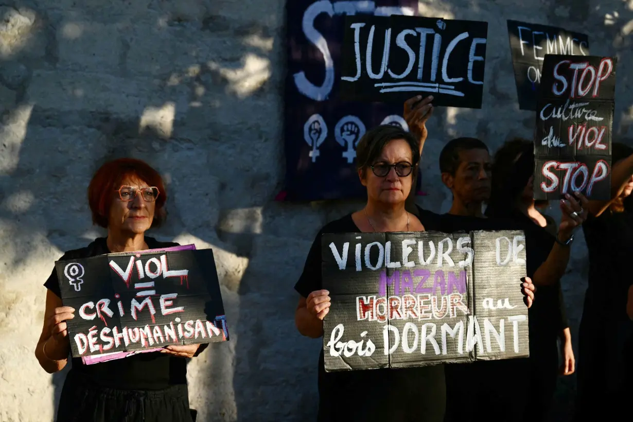 Demonstrators protest outside the courthouse during the trial of a man accused of drugging his wife for nearly 10 years and inviting strangers to rape her at their home in Mazan, a small town in the south of France, on September 2.