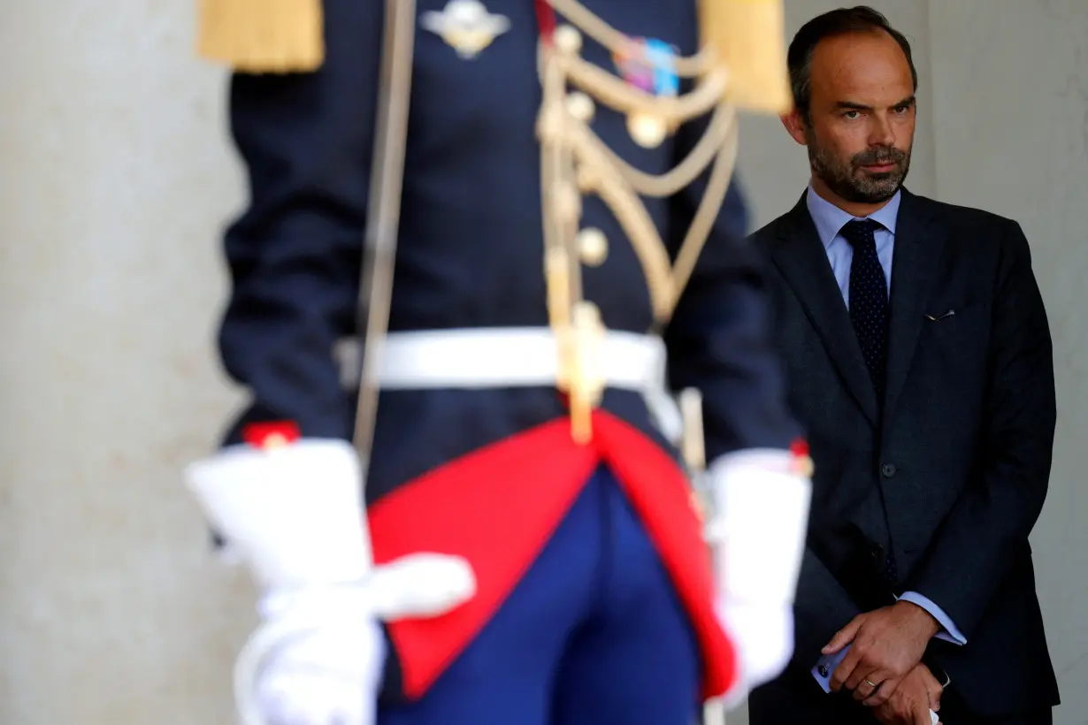 FILE PHOTO: Then French Prime Minister Edouard Philippe leaves the Elysee palace in Paris