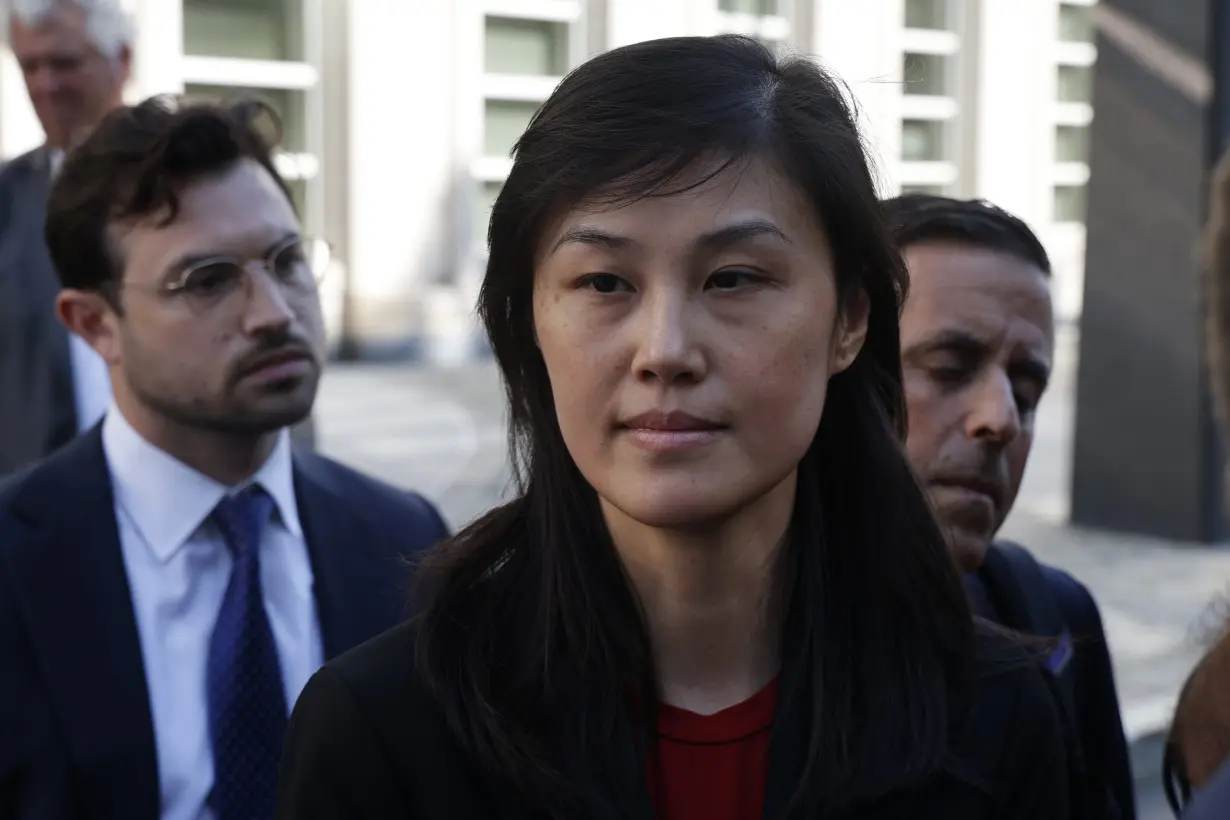 Former aide to 2 New York governors is charged with being an agent of the Chinese government