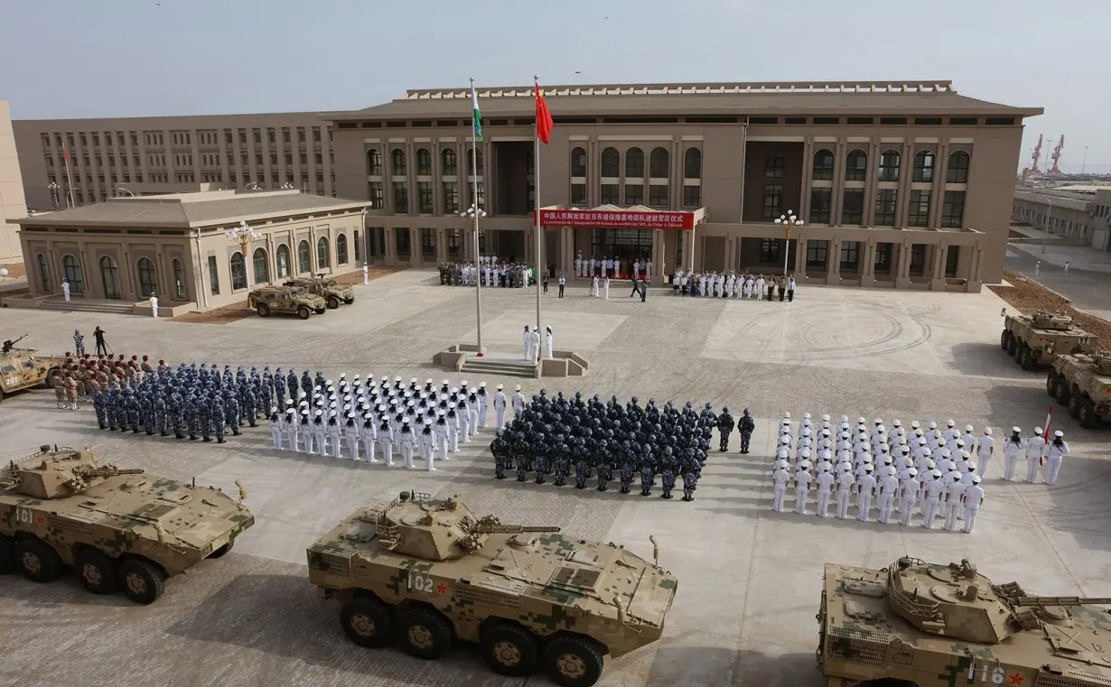 Chinese People's Liberation Army personnel hold an opening ceremony for China's new military base in Djibouti.