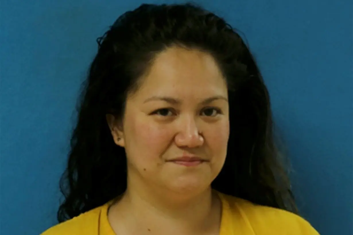 Elizabeth Wolf poses for an undated police booking photograph