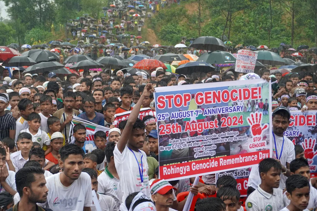 FILE PHOTO: Rohingya refugees mark seventh anniversary of fleeing from Myanmar, in Cox's Bazar