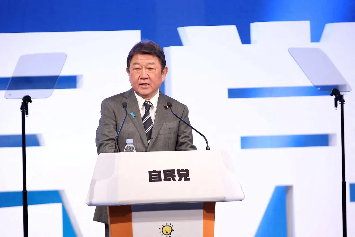 FILE PHOTO: Japan's ruling Liberal Democratic Party lawmakers hold an annual party convention, in Tokyo