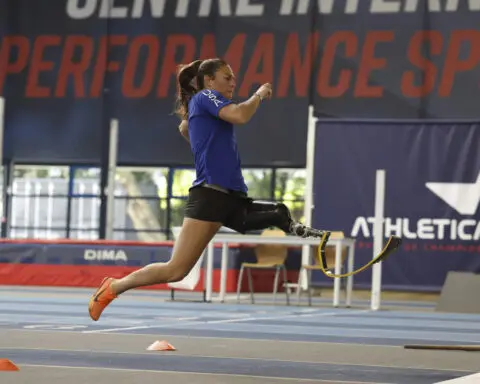 New to long jump, U.S. Paralympians Lambert and Wallace form unlikely partnership