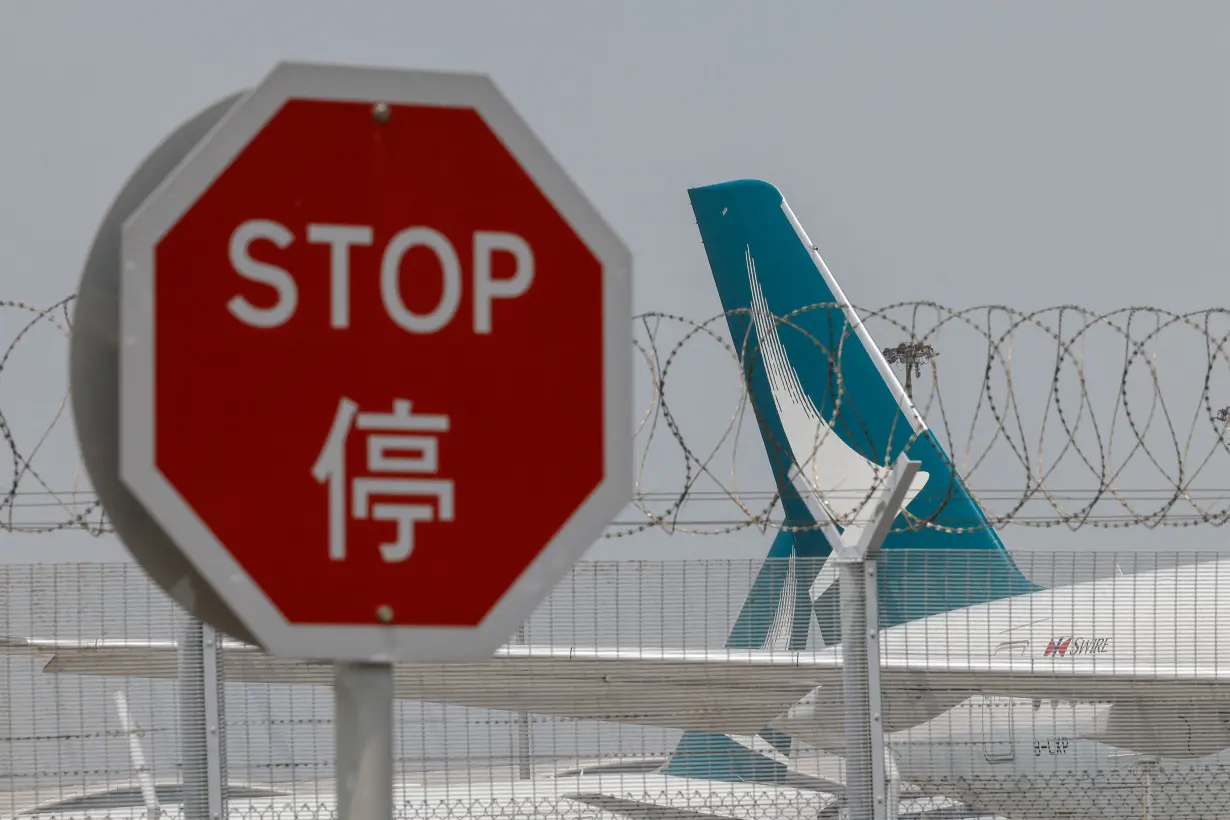 A Cathay Pacific Airbus A350 aircraft is seen in Hong Kong International Airport, in Hong Kong