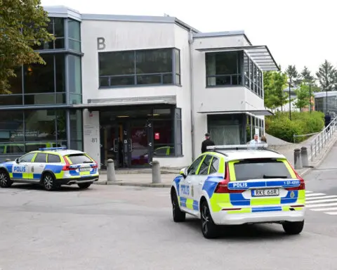 Teenager shot and wounded at Swedish school, suspect apprehended, police say