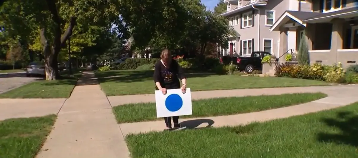 'Blue dot' signs popping up in Omaha aim to highlight importance of swing district