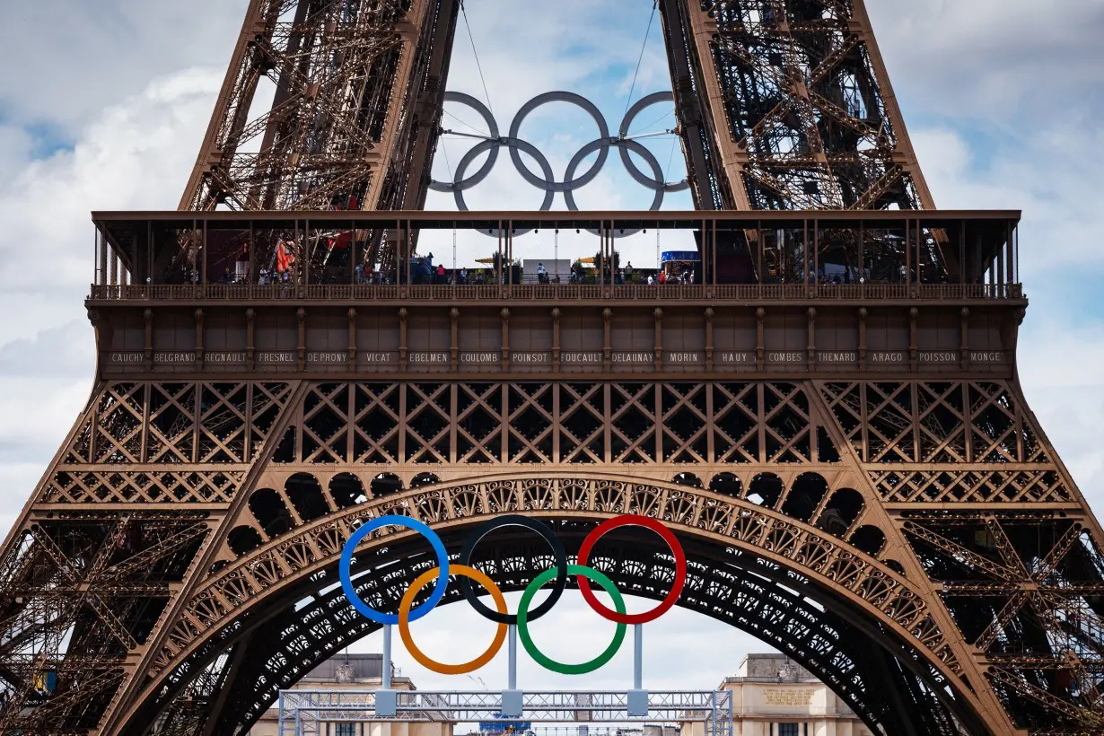 Paris mayor plans to keep Olympic rings on the Eiffel Tower. But not everyone is happy