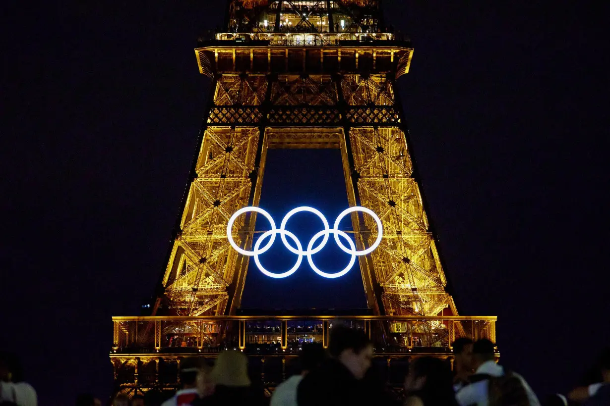 Paris mayor plans to keep Olympic rings on the Eiffel Tower. But not everyone is happy